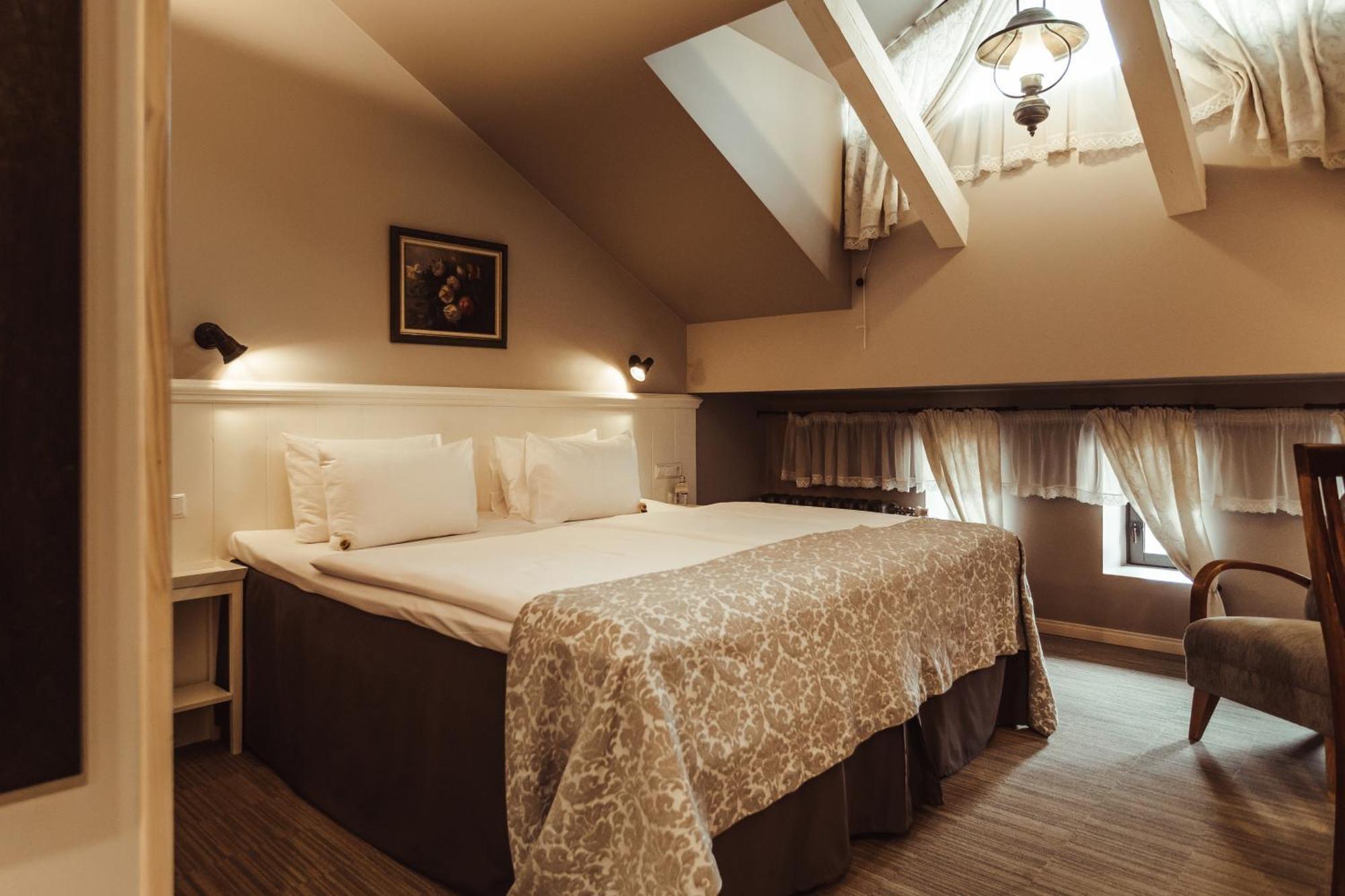 Promenade Hotel Liepaja Bagian luar foto A room at the hotel