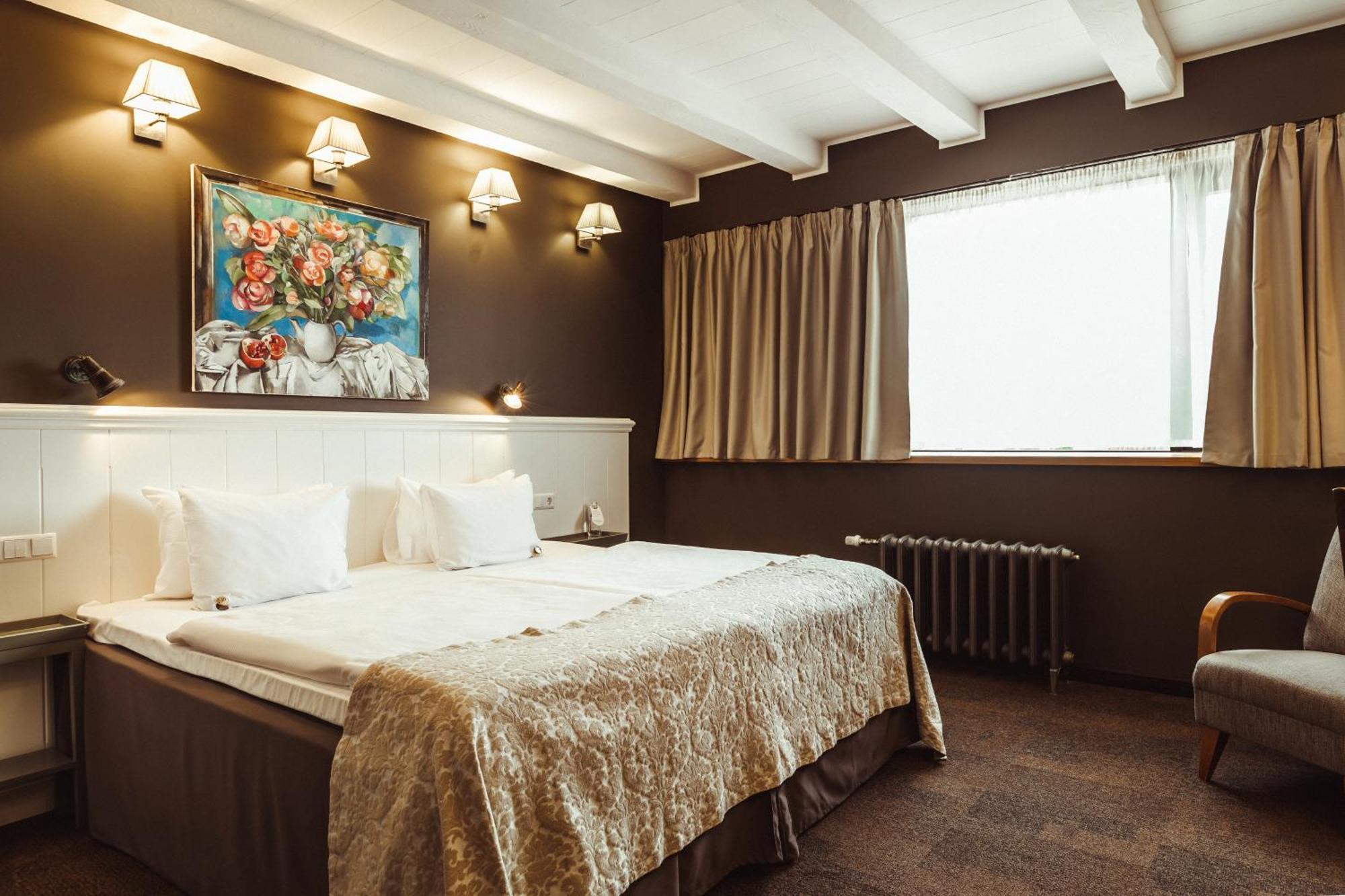 Promenade Hotel Liepaja Bagian luar foto A room at the hotel